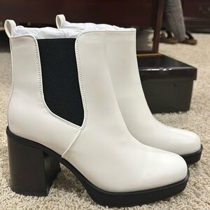 SHEIN black and white boots, size 7.